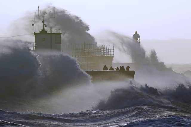 The Met Office has warned that a weather phenomenon known as a sting jet could form on Friday as Storm Eunice takes hold.

Waves crash against the sea wall and Porthcawl Lighthouse in Porthcawl, Bridgend, Wales, as Storm Eunice hits the south coast.