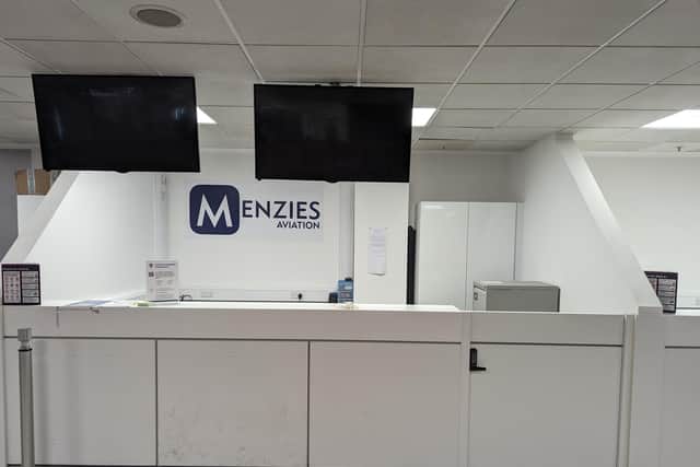 The empty Menzies Aviation desk which confronted passengers with mislaid bags (Photo by Gary Winfield)