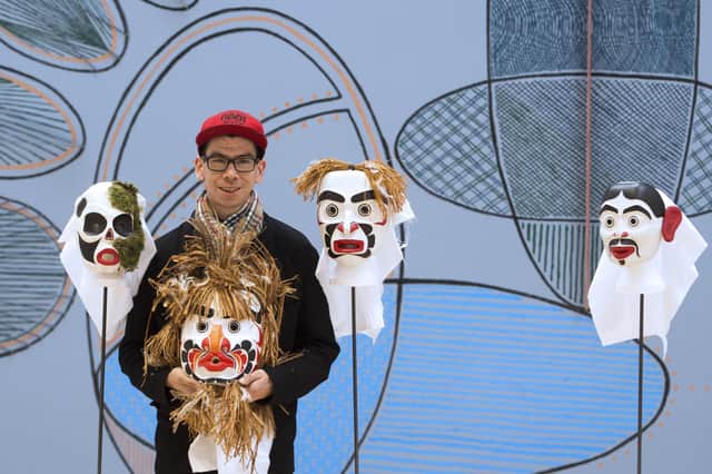 Artist Alan Hunt with masks from the Kwakwaka’wakw community of Canada's Pacific coast - part of the Pine's Eye exhibition at the Talbot Rice Gallery. PIC: Neil Hanna Photography