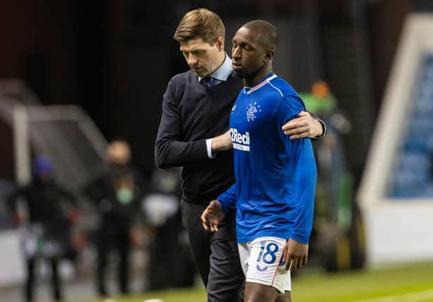 Glen Kamara is consoled by Rangers manager Steven Gerrard after alleged racial abuse aimed at the midfielder. Picture: SNS
