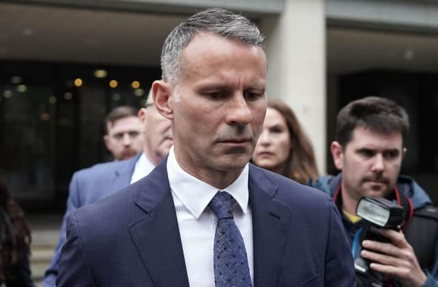 Ryan Giggs leaves Manchester Crown Court after appearing for a plea and trial preparation hearing on May 28, 2021 in Manchester, England. The former Manchester United midfielder, who is currently the manager of Wales' men's international football team, is accused of causing actual bodily harm to a woman in her 30s, common assault to a woman in her 20s and of coercive and controlling behaviour. He denies the charges. (Photo by Christopher Furlong/Getty Images)