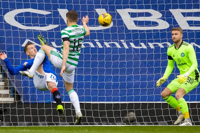 Steven Davis scoring the opening goal with an overhead kick. Picture: SNS