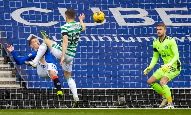 Steven Davis scoring the opening goal with an overhead kick. Picture: SNS