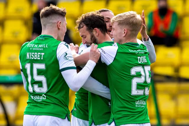 Hibs' Christian Doidge proved to be a popular goalscorer as team-mates welcomed his first goal in 16 games. Photo by Alan Harvey / SNS Group