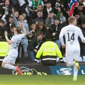 Elias Melkersen celebrates scoring to make it 2-0 to Hibs during a Scottish Cup match against  Motherwell at Fir Park.