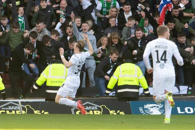 Elias Melkersen celebrates scoring to make it 2-0 to Hibs during a Scottish Cup match against  Motherwell at Fir Park.