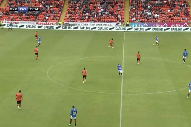 PICTURE ONE: A rather deep Lundstram has a couple of options to force the issue but instead goes back to Goldson (far right). The defender eventually goes direct to Tavernier (top left).