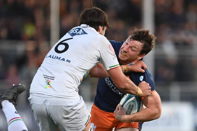 Edinburgh's Hamish Watson is challenged by Zebre's Liam Mitchell in last weekend's URC fixture at the DAM Health Stadium.  (Photo by Paul Devlin / SNS Group)