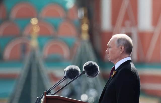 Russian President Vladimir Putin gives a speech during the Victory Day military parade at Red Square in central Moscow.