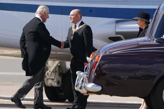 The First Minister of Scotland Nicolas Sturgeon waits to greet King Charles III as he arrives at Edinburgh Airport after travelling from London with the Queen Consort, ahead of joining the procession of Queen Elizabeth's coffin from the Palace of Holyroodhouse to St Giles' Cathedral, Edinburgh. Picture date: Monday September 12, 2022.