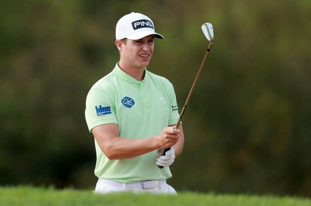 Calum Hill sizes up a shot in the first round of the Jonsson Workwear Open at The Club at Steyn City in South Africa. Picture: Warren Little/Getty Images.