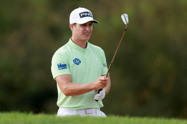 Calum Hill sizes up a shot in the first round of the Jonsson Workwear Open at The Club at Steyn City in South Africa. Picture: Warren Little/Getty Images.