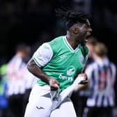 Hibs defender Rocky Bushiri shows his frustration as St Mirren celebrate Lewis Jamieson's injury-time equaliser. (Photo by Ross MacDonald / SNS Group)