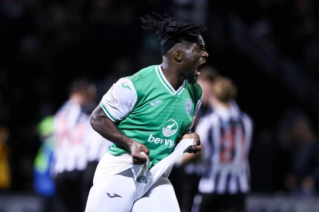 Hibs defender Rocky Bushiri shows his frustration as St Mirren celebrate Lewis Jamieson's injury-time equaliser. (Photo by Ross MacDonald / SNS Group)