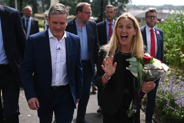 Labour Party leader Keir Starmer (left) and Labour candidate Kim Leadbeater leave Cleckheaton Memorial Park during a visit following Labour's victory in the Batley and Spen by-election. Picture: Oli Scarff/AFP via Getty Images