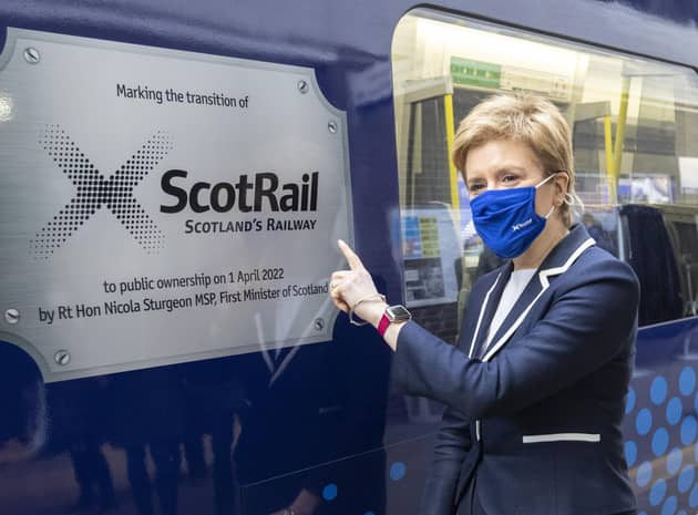 Nicola Sturgeon unveiled a specially branded train at Glasgow Queen Street Station to mark ScotRail becoming publicly owned (Picture: Robert Perry/PA)
