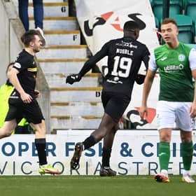 Livingston's Alan Forrest celebrates making it 3-2 against Hibs at Easter Road. (Photo by Paul Devlin / SNS Group)