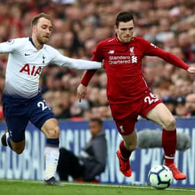 Former Tottenham midfielder Christian Eriksen and Liverpool's Andrew Robertson in action during a Premier League match in 2019. (Photo by Clive Brunskill/Getty Images)