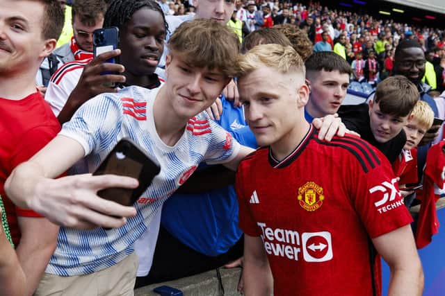 Manchester United's Donny van de Beek gets up close and personal with fans at Murrayfield. He scored the winner in the 1-0 friendly win over Lyon (Photo by Mark Scates / SNS Group)