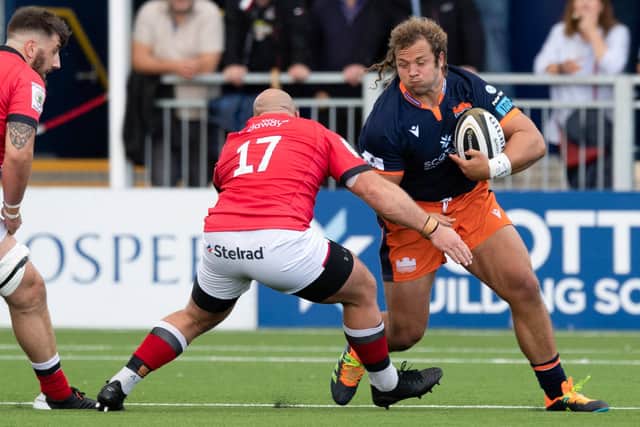 Pierre Schoeman enjoys playing on Edinburgh's new artificial pitch which makes for a faster game. Picture: Ross Parker/SNS