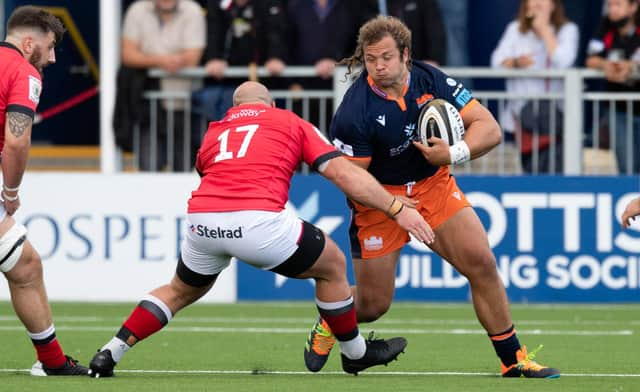 Pierre Schoeman enjoys playing on Edinburgh's new artificial pitch which makes for a faster game. Picture: Ross Parker/SNS