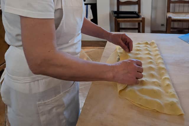 A pasta making lesson. Pic: Claire Spreadbury/PA.