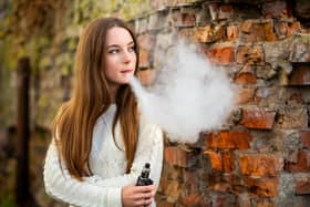 A teenager smoking an electronic cigarette. Picture: Getty Images