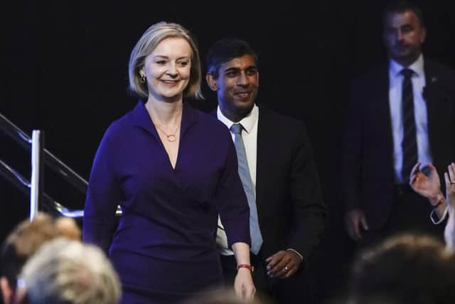 Liz Truss, left, and Rishi Sunak arrive for the announcement of the result of the Conservative Party leadership contest. Picture: AP Photo/Alberto Pezzali
