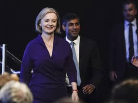 Liz Truss, left, and Rishi Sunak arrive for the announcement of the result of the Conservative Party leadership contest. Picture: AP Photo/Alberto Pezzali