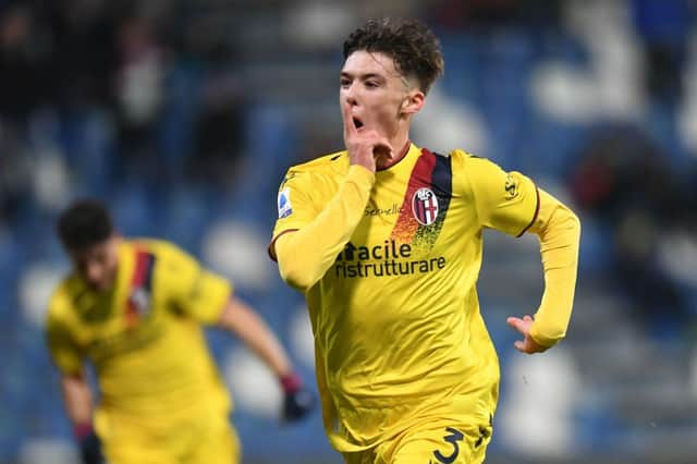 Aaron Hickey celebrates after scoring against Sassuolo last month. (Photo by Alessandro Sabattini/Getty Images)