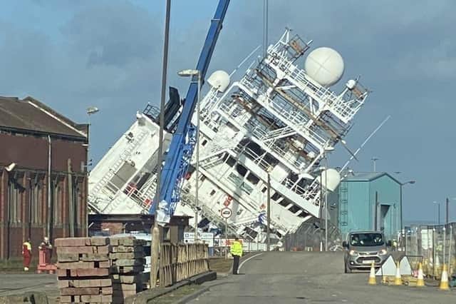 Research vessel Petrel leaning on its side in the dry dock. Picture: @Tomafc83 on Twitter