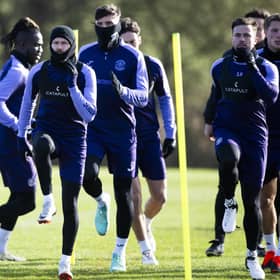 Martin Boyle, centre, trains ahead of Hibs' match with Celtic.