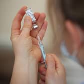 A nurse prepares a dose of Covid-19 vaccine (Picture: Nick Potts/PA)