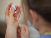 A nurse prepares a dose of Covid-19 vaccine (Picture: Nick Potts/PA)
