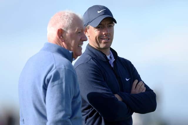 Rory McIlroy chats with his dad Gerry during the final round of the Alfred Dunhill Links Championship on the Old Course at St Andrews. Picture: Oisin Keniry/Getty Images.