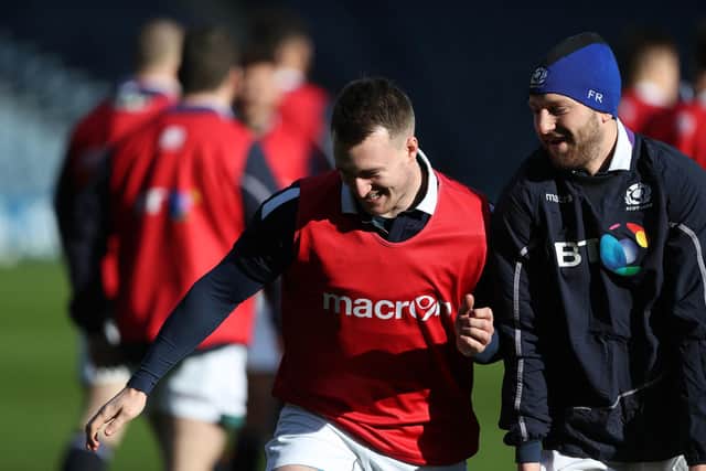 Stuart Hogg and Finn Russell together on Scotland duty. They will be on opposite sides on Saturday night.