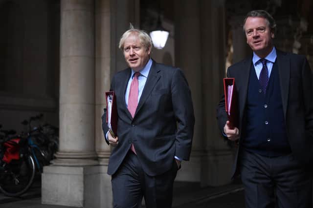 Boris Johnson returns to Downing Street with Scotland Secretary Alister Jack. Picture: Leon Neal/Getty Images