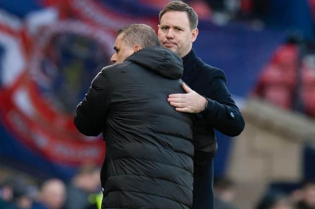 Celtic manager Ange Postecoglou and Rangers manager Michael Beale embrace after the Parkhead club's 2-1 Viaplay final win that was about meeting internal challenges not getting one over on his club's greatest rival.(Photo by Craig Foy / SNS Group)