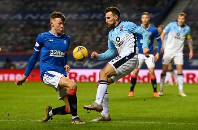 Rangers teenage full-back Nathan Patterson, pictured challenging Tony Andreu, made his fourth appearance of the season as a substitute for James Tavernier in the 5-0 win over Ross County at Ibrox. (Photo by Rob Casey / SNS Group)
