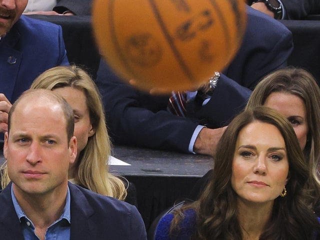 William and Kate take in the game.