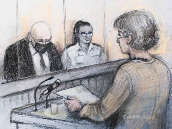 A court artist's sketch of Susan Everard, the mother of Sarah, reading a victim impact statement as former Metropolitan Police officer Wayne Couzens (left) sits in the dock (Sketch by Elizabeth Cook/PA)