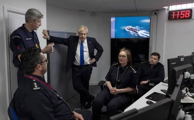 Boris Johnson visits the command room at the Maritime Rescue Coordination Centre in Dover (Picture: Dan Kitwood/pool/AFP via Getty Images)