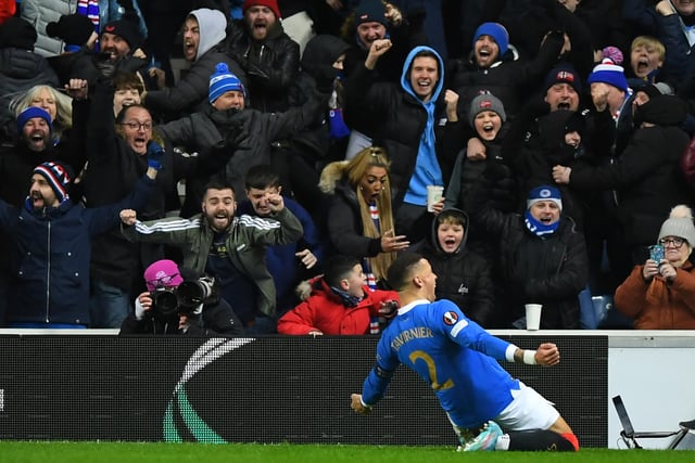 Rangers' English defender James Tavernier celebrates with fans after scoring their second goal. (Photo by ANDY BUCHANAN / AFP) (Photo by ANDY BUCHANAN/AFP via Getty Images)