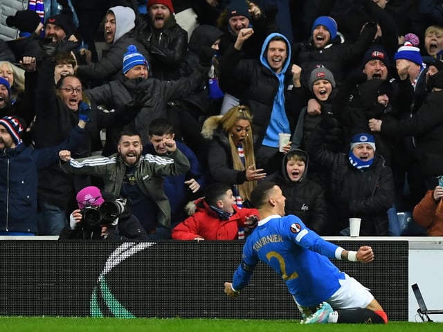 Rangers' English defender James Tavernier celebrates with fans after scoring their second goal. (Photo by ANDY BUCHANAN / AFP) (Photo by ANDY BUCHANAN/AFP via Getty Images)
