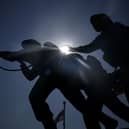 The sun shines behind the British Normandy Memorial at Ver-sur-Mer, France.  (Photo by Christopher Furlong/Getty Images)