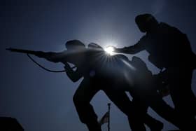 The sun shines behind the British Normandy Memorial at Ver-sur-Mer, France.  (Photo by Christopher Furlong/Getty Images)