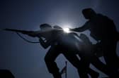 The sun shines behind the British Normandy Memorial at Ver-sur-Mer, France.  (Photo by Christopher Furlong/Getty Images)