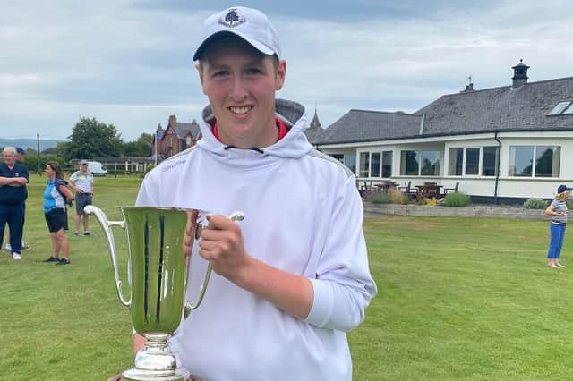 Kemnay’s Fraser Laird shows off the trophy after winning the Scottish Boys' Championship at Edzell. Picture: Scottish Golf.