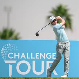 Euan Walker plays his tee shot on the 1st tee during day one of the Abu Dhabi Challenge at Al Ain Equestrian, Shooting and Golf Club. Picture: Octavio Passos/Getty Images.