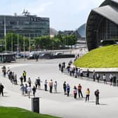 Queues outside the vaccination centre at Glasgow's Hydro in early June. Picture: John Devlin